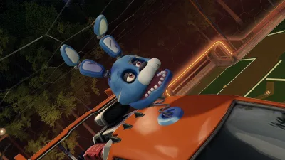 Topper de Bonnie sobre un coche naranja