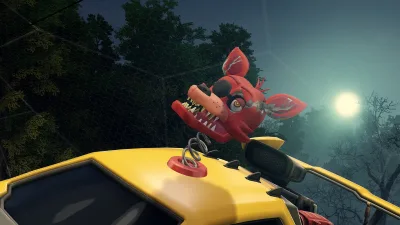 Topper de Foxy sobre un coche amarillo